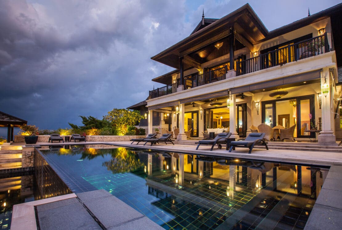 Professional outdoor lighting installed on large home